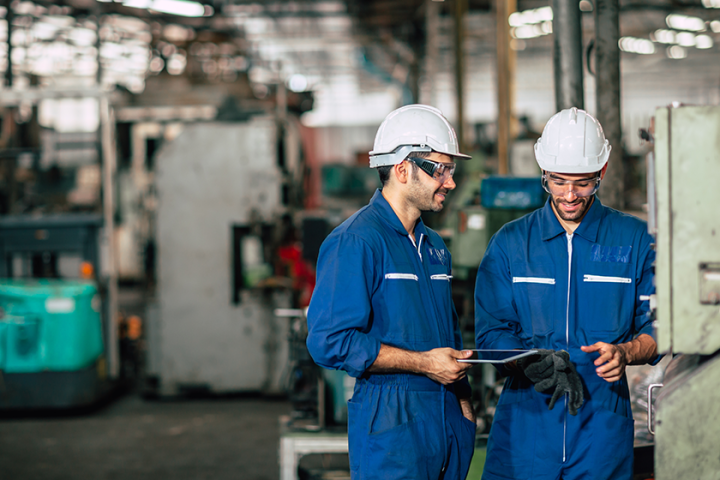 engineering team heavy industry factory working together
