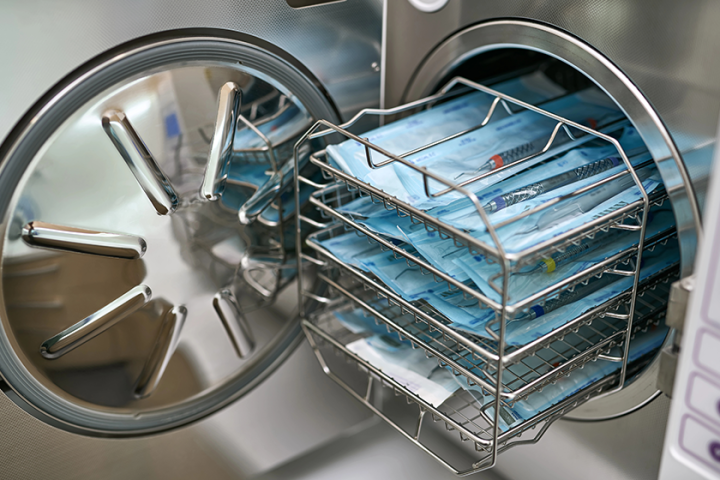 Sterilize machine with opened door and dental probes