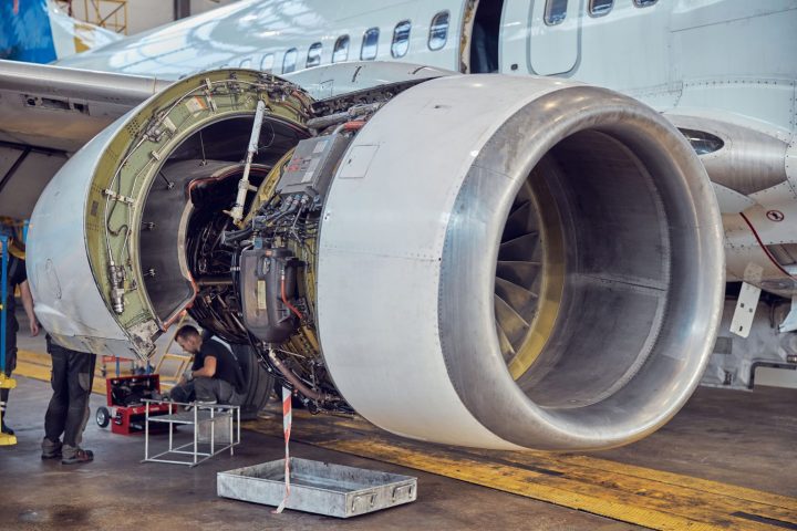 close-up-image-big-open-turbine-with-wing-scheduled-modernization-passenger-airplane-aerodrome-1-1536x1024